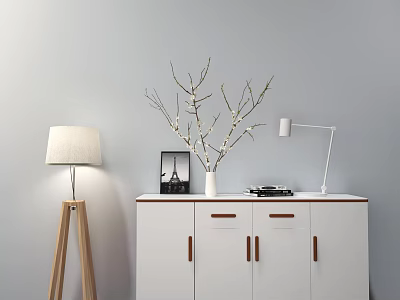 White Shoe Cabinet with Brown Handles Top Vase Branches Eiffel Tower Photo Frame and Lamps 3d model