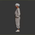 Elderly Person With White Hair Standing In Light Gray Jumpsuit Hands In Pockets White Shoes