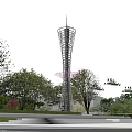 Modern Tower With Metal Spiral Structure And Trees In Nighttime View 3d model