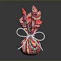 Colorful Patterned Food Gift Package Tied With White Ribbon Bow
