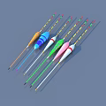 Multiple Colorful Fishing Floats With Slender Poles In Blue Orange White Green Pink