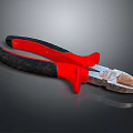 Professional Pliers With Red And Black Handles And Metal Cutting Jaws