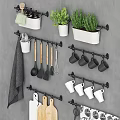 Kitchen Decorative Ornament Combination With Hanging Rods Utensils Mugs Cutting Boards Towels And Potted Plants