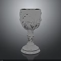 Exquisite Silver Goblet With Intricate Carved Designs And Ornate Base As Home Living Accessory