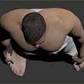 Shirtless Man Standing Wrapped in Gray Towel Against Gray Background Barefoot