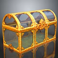 Ornate Golden Glass Chest With Decorative Frame And Intricate Carvings