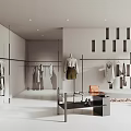 Modern Clothing Store Interior With Hanging Apparel Mannequins Display Table And Plants