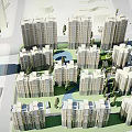 Modern Urban Residential Complex With High Rise Buildings And Lush Greenery