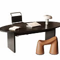 Modern Wooden Desk With Oval Top Featuring Laptop Lamp And Open Book Near Brown Stool