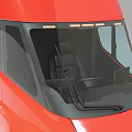 Red Tesla Semi Electric Truck With Streamlined Front Design And Modern Look