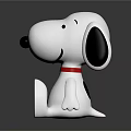 Snoopy Toy Figurine In Sitting Pose With White Body Black Ears Red Collar