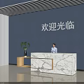 Modern Marble Reception Desk With Blue Wall Green Plant And Welcoming Receptionist