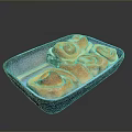 Golden Brown Sweet Rolls In Blue And White Baking Dish With Frosting