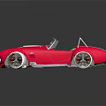 Red Vintage Convertible Sports Car Featuring White Stripes And Open Top Design