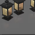 Three Black Outdoor Lights With Stripe Shades Decorative Spires And Square Bases Illuminated