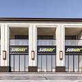 Modern Two Story Commercial Street With Glass Shop Fronts And Architectural Design