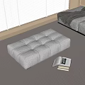 Tufted Light Gray Ottoman with Open Book and Books on Rug Near Sofa and Window