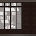 Modern Dark Wood Bookcase With Glass Doors And Shelves Filled With Books