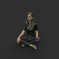 Woman Sitting On Floor In Black Tight Outfit Gray Top And Golden Shoes Gray Background