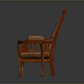 Brown Upholstered Armchair With Wooden Frame And Small Round Table