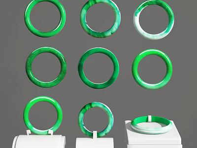 Multiple Elegant Green Jade Bracelets Displayed On White Jewelry Stands 3d model