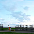 Modern Metal Entrance Gate With Railing Design Security Booth And Green Lawn Under Blue Sky