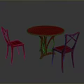 Red Round Dining Table With Two Red Chairs In Dark Background