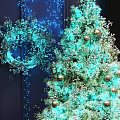 Festive Christmas Tree Decorative Ornament Set with Golden Baubles Blue Lights Gift Boxes and Wreath