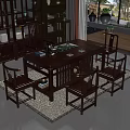 Traditional Chinese Solid Wood Tea Table And Chairs With Tea Set In Living Room