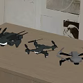 Fun Remote Control Drone Toys With Three Different Designs On Wooden Table 3d model