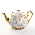 Delicate Floral Teaware Set with Teapots Teacups Saucers and Fruit Topped Tarts on White Tablecloth