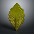 Green Leaf With Textured Veins And Three Dimensional Shape On Gray Background