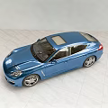 Blue Porsche Panamera Luxury Sedan With Streamlined Design In Indoor