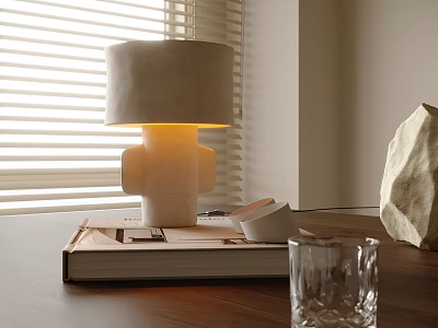 Modern Table Lamp with Beige Lampshade on Large Book Small Cup Glass and Wooden Table 3d model