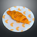 Golden Croissant On White Plate With Orange Croissant Patterns