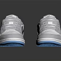 White And Gray Nike Low Top Sneakers With Blue Sole And Black Logo