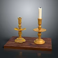 Decorative Golden Candle Holders With White Candle On Wooden Base