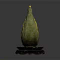 Ancient Decorative Shield Weapon With Golden Winged Creature Design And Black Wooden Base