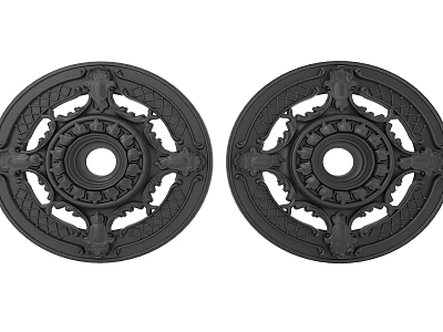 Intricate Carved Decorative Discs Featuring Ornate Patterns And Central Circular Openings 3d model