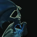 Artistic Mythical Dragon Sculpture With Spread Wings And Rock Base Design