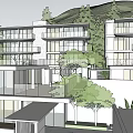 Modern Multi Story Guesthouse With Large Windows Balconies Trees And Mountain View