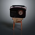 Vintage Retro Radio Electronic Appliance With Black Red Design On Wooden Stool