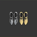 Stylish Silver And Gold Shoes With Shoelaces Reflective Material Three Pairs On Black Background