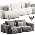 Modern Sofa Designs Featuring Light And Dark Gray Upholstery With Pillows And Throw Blankets