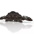 Intricate Wooden Sculpture Carving With Cloud Shaped Design And Ornate Patterns