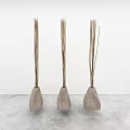 Three Wooden Reed Diffusers With Fragrance Sticks On Gray Floor White Background