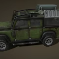 Military Style Green Off Road Vehicle With Worn Exterior Headlights On And Roof Light Bar