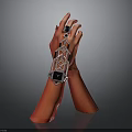 Red Hand Model Displaying Stylish Wrist Accessory With Geometric Patterns And Black Gemstones
