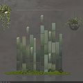 Floral Art Installation With Vertical Green Panels Hanging Plants And Mossy Base