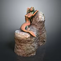 Artistic Mermaid Statue With Copper Tail Sitting On Natural Rock Base Design